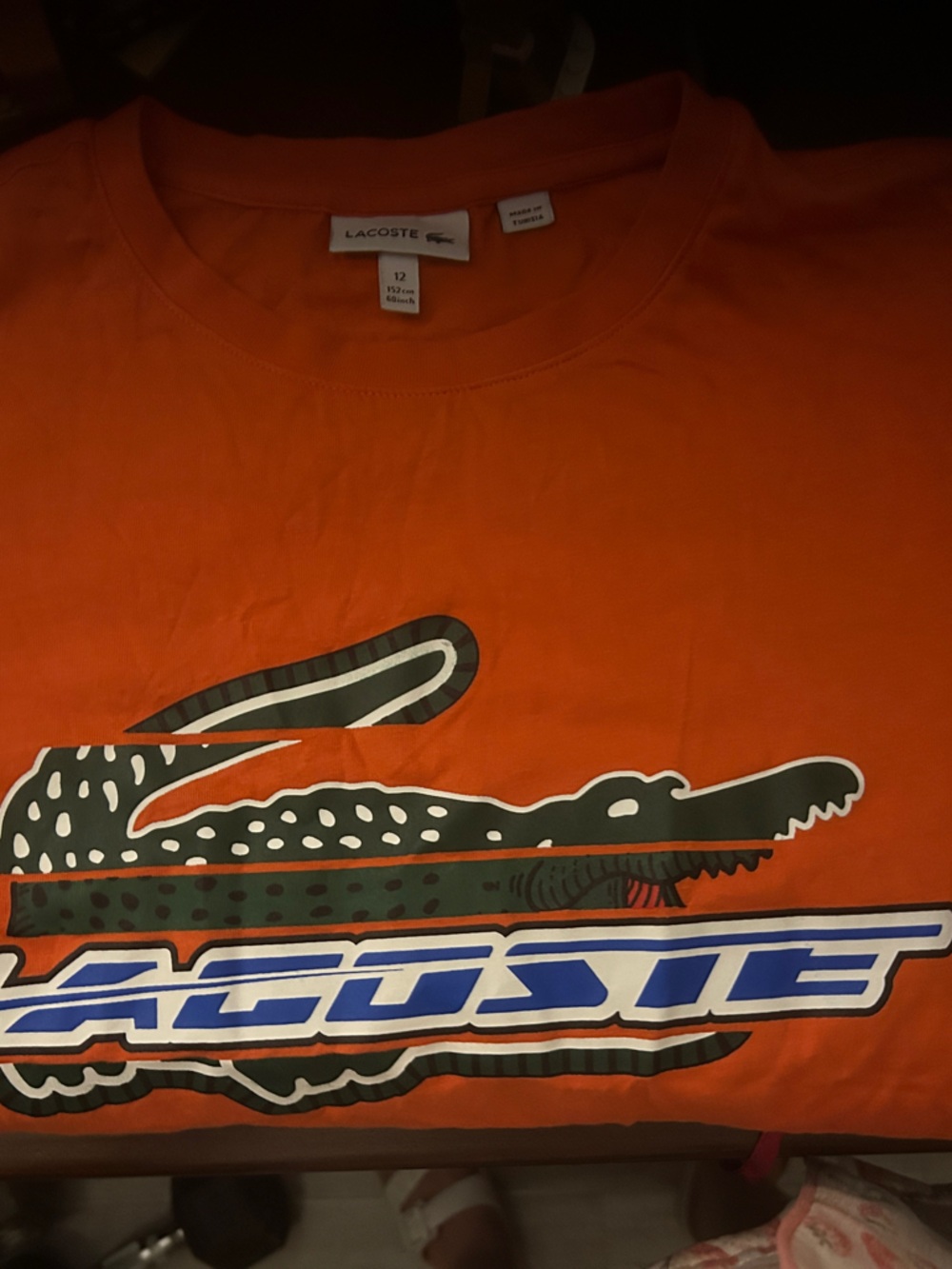 Lacoste Orange Tee with Blue & Black Croc Graphic